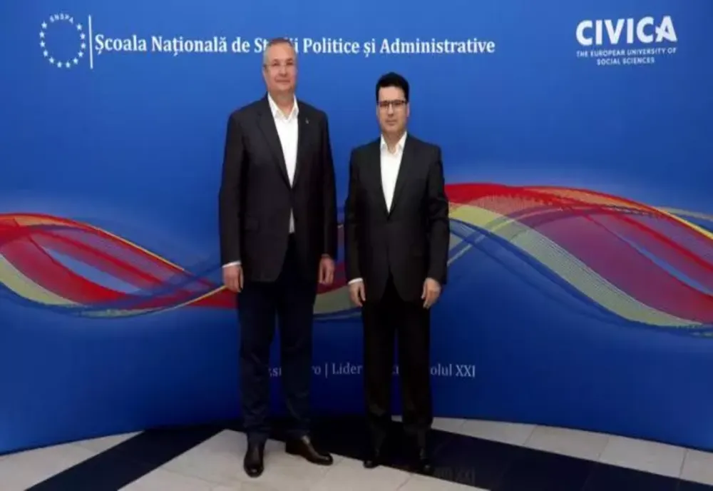 Nicolae Ciucă, în vizită la SNSPA. Președintele PNL s-a întâlnit cu rectorul Remus Pricopie