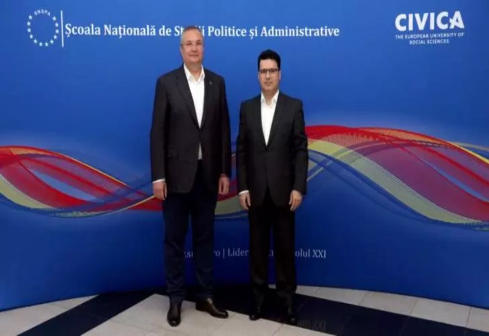 Nicolae Ciucă, în vizită la SNSPA. Președintele PNL s-a întâlnit cu rectorul Remus Pricopie